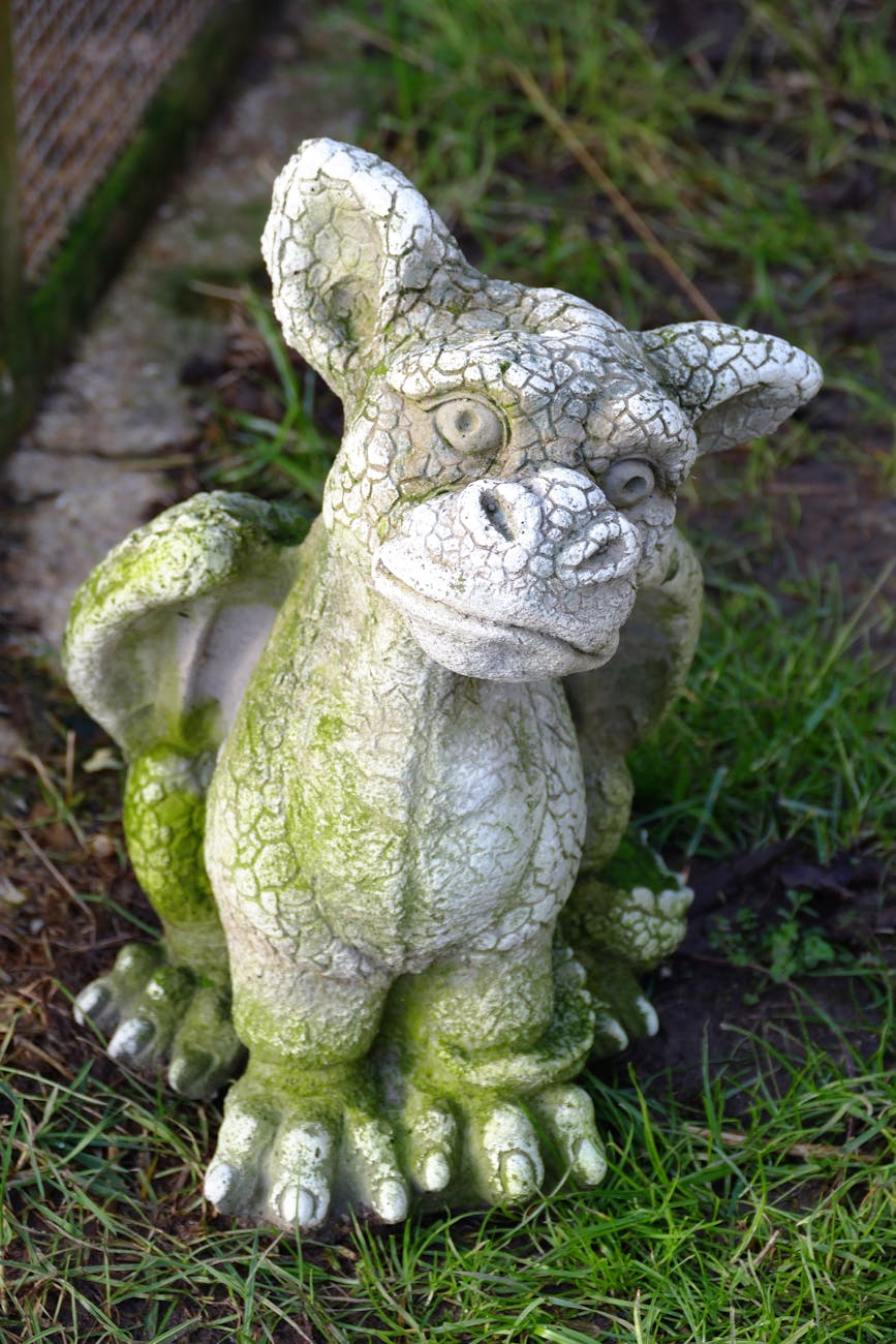 white ceramic animal statue